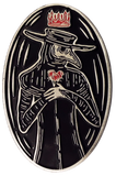 A large enamel pin with artwork of a traditional plague doctor wearing a black mask with red roses and a red crown, with an antique silver metal finish.