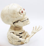 The Miser Cast Iron Skull Bank