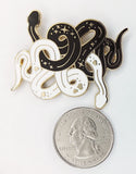 Snakes on a Pin